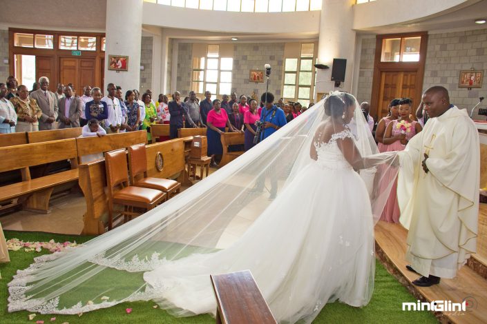 Wedding Photography, the bride walking down the isle and approaching the Holy Altar