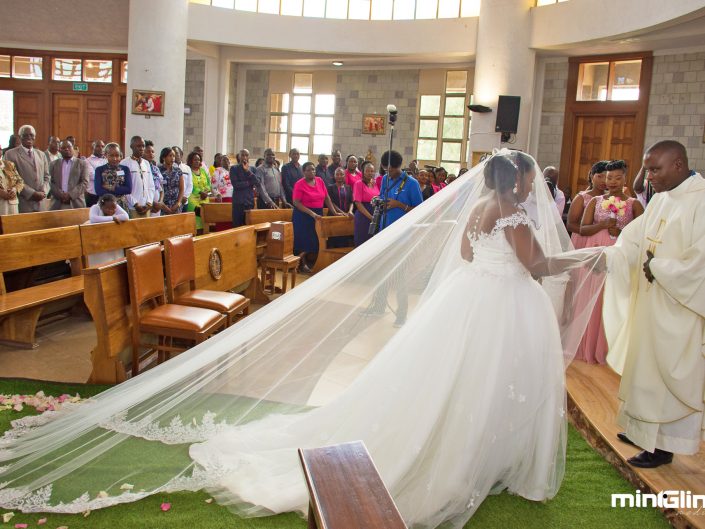 Wedding Photography, the bride walking down the isle and approaching the Holy Altar