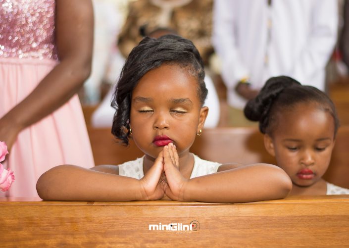 Flower girl Praying at a Church Wedding; Photography and Video Production by Mint Glint Media