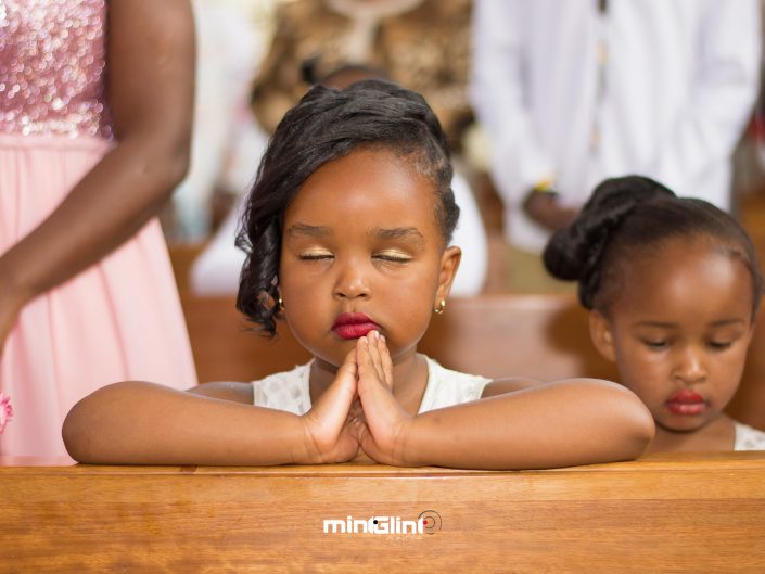 Flower girl Praying at a Church Wedding; Photography and Video Production by Mint Glint Media