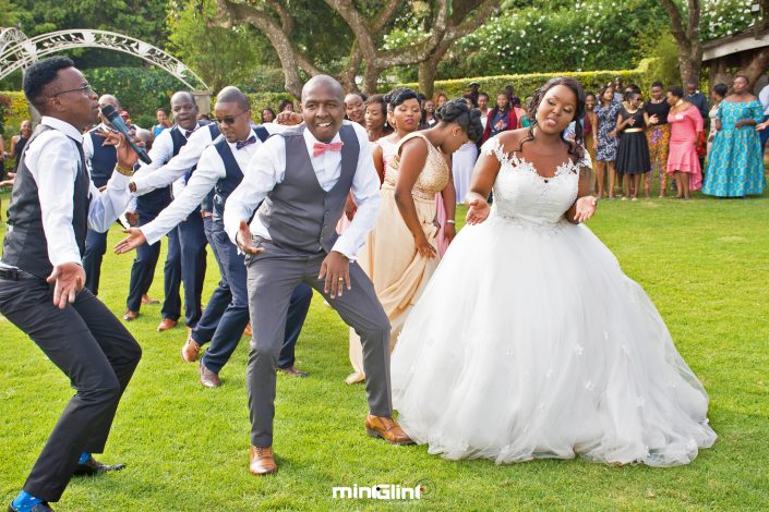 Luxury Wedding Photography The Groom and her Bride dancing at their wedding reception