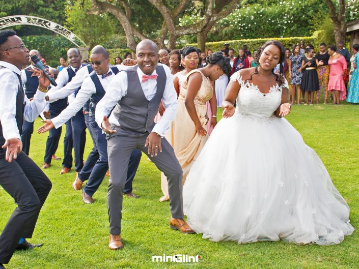 Luxury Wedding Photography The Groom and her Bride dancing at their wedding reception