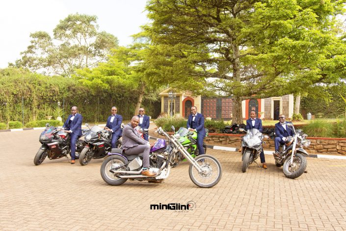 Luxury Wedding Photography The Groom and his Grooms men on Bike at the formal shoot