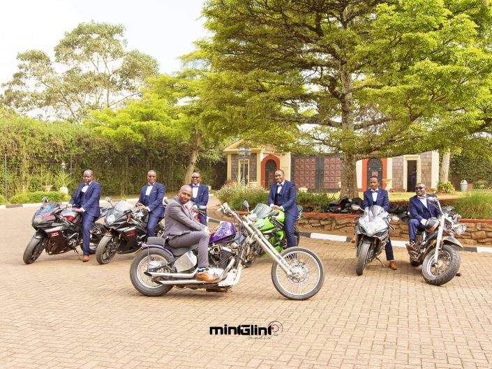 Luxury Wedding Photography The Groom and his Grooms men on Bike at the formal shoot