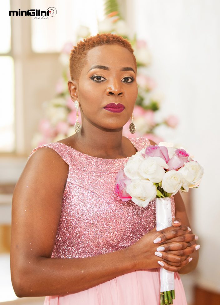 Bridesmaid at a Church Wedding; Photography and Video Production by Mint Glint Media