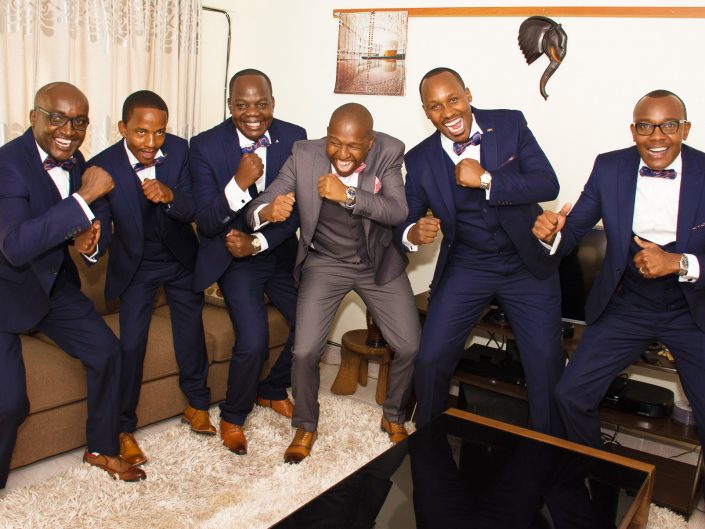 The Groom and his Groomsmen looking dope and well groomed.