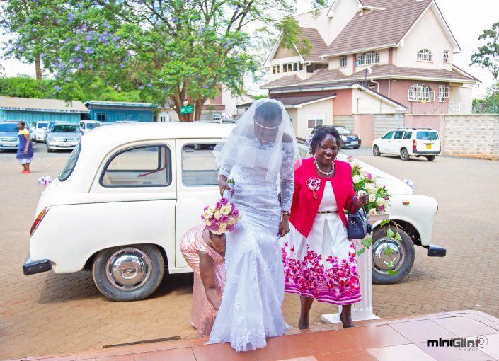 Wedding Photography by Mint Glint Media; The Bride giving at her wedding with her mum