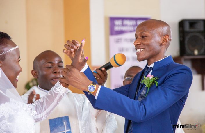 Wedding Photography by Mint Glint Media; The Groom giving the wedding ring to his Bride