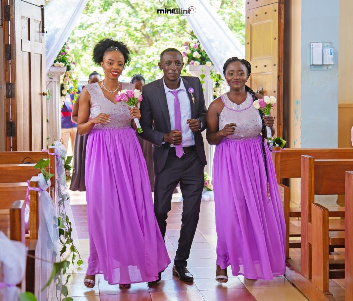 Bridesmaids and Groomsman dancing down the isle ; Wedding photography by Mint Glint Media