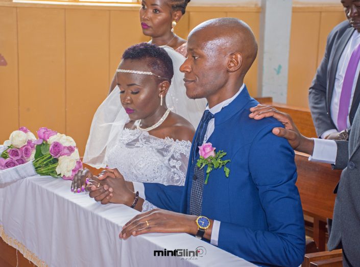 Bride and Groom praying at their wedding photography by Mint Glint Media