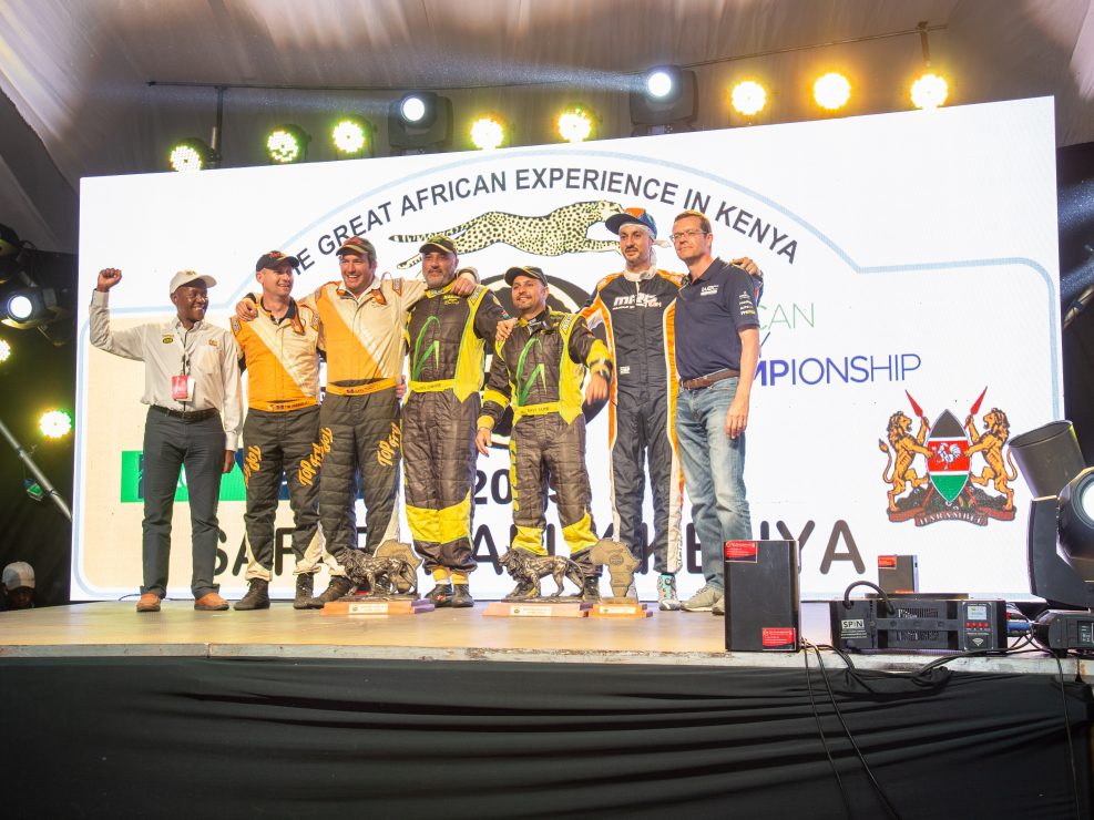 Baldev Chager and his navigator Ravi Soni alongside the first and second runners-up celebrate their win of 2019 Safari Rally to the right is Oliver Ciesla - Managing Director - WRC Promoter GmbH and to the left is Phineas Kimathi the CEO of Safari Rally Project in Kenya.