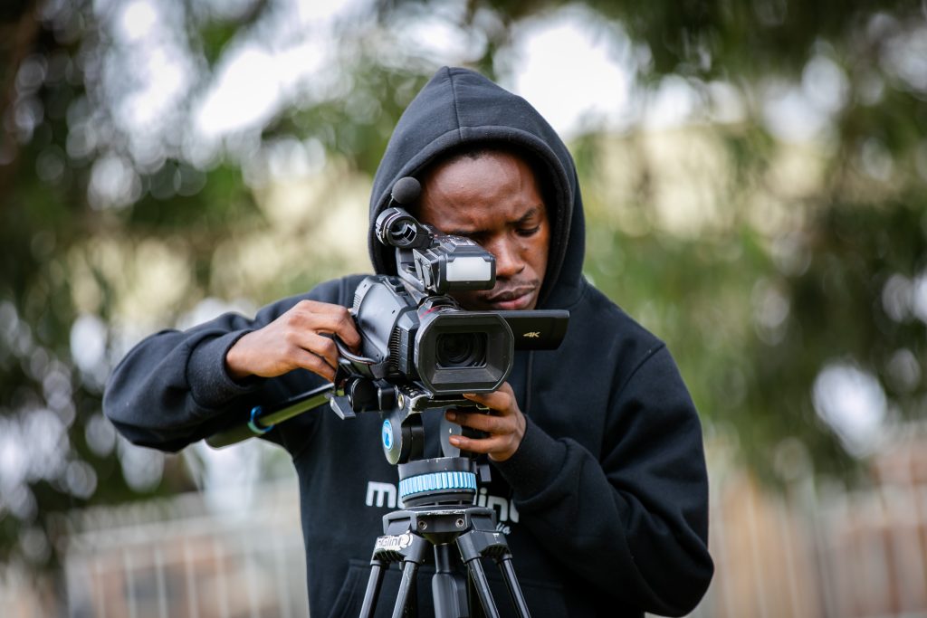 Professional filming with professional camera equipment. At a audio visual event 
