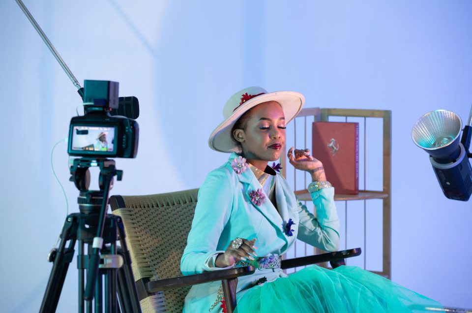 Sanaa Champion Kaira performing on stage during the Mint Glint Studio music video production.